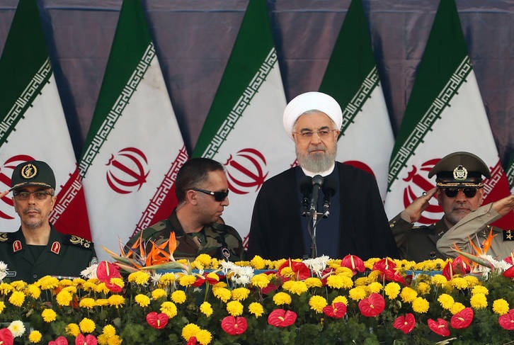 روحانی در مراسم رژه نیروهای مسلح: مي گويند در منطقه حضور نداشته باشيد پس خودتان چرا هزاران كيلومتر از كشور خود گذشته و به اين منطقه آمده ايد؟